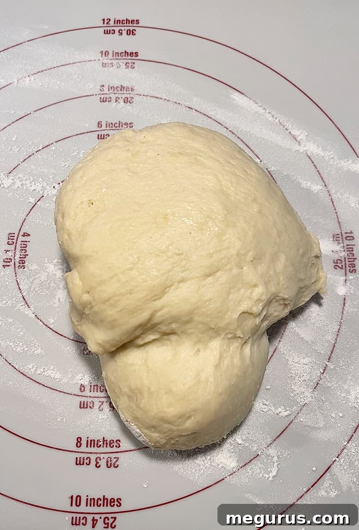 Dough after rising, visibly doubled in size and puffy
