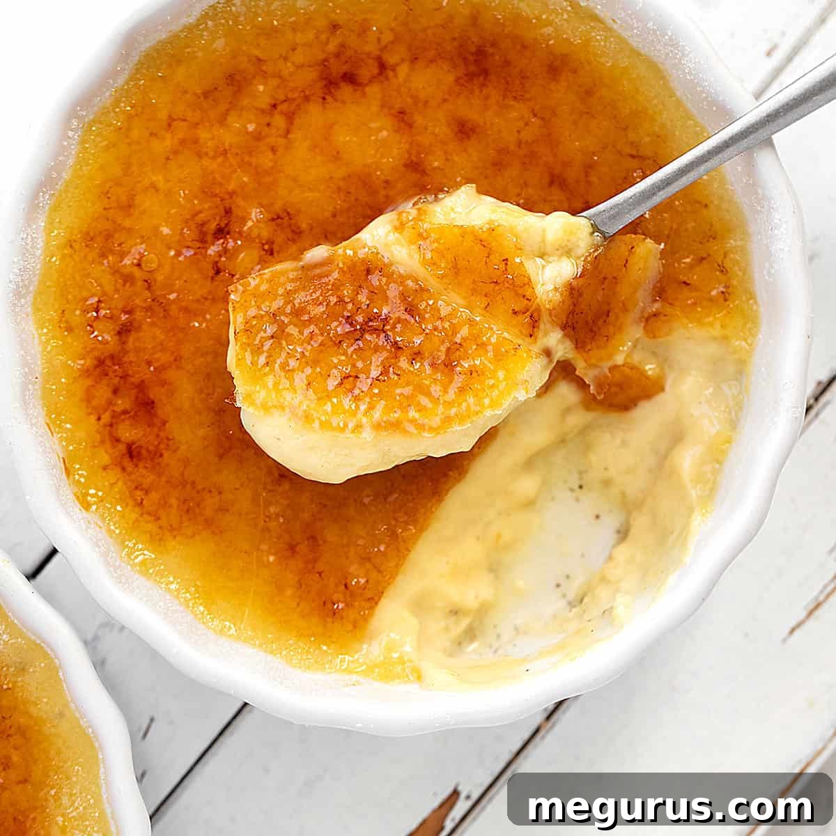 maple creme brulee in ramekin with spoon