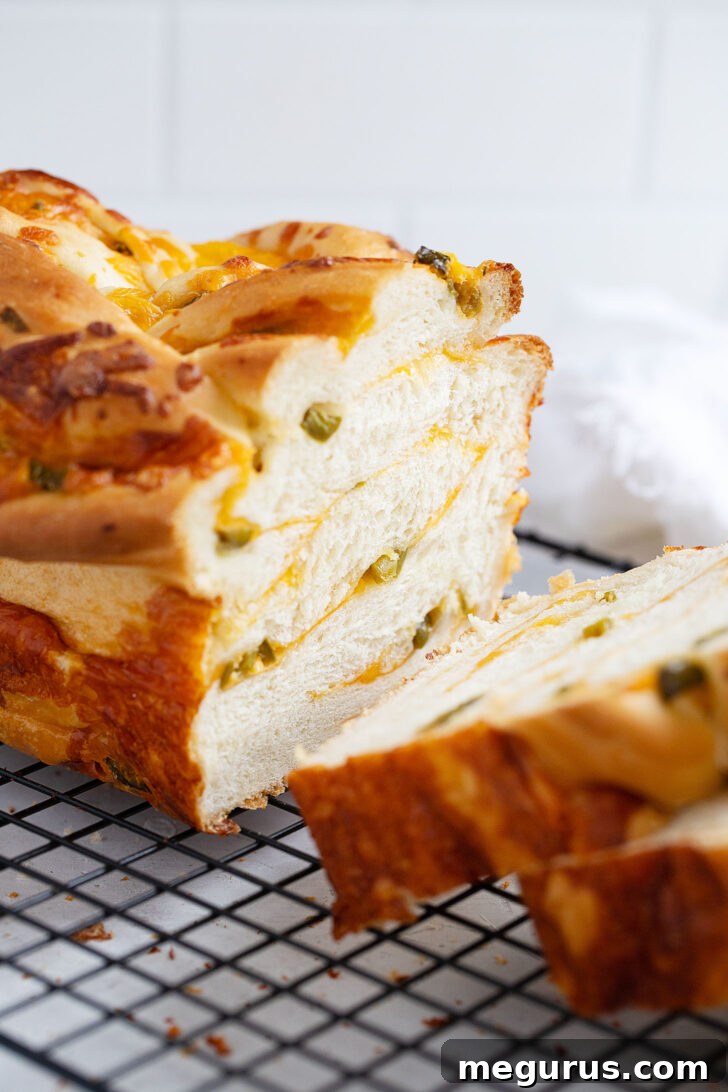 jalapeno cheese bread sliced on cooling rack