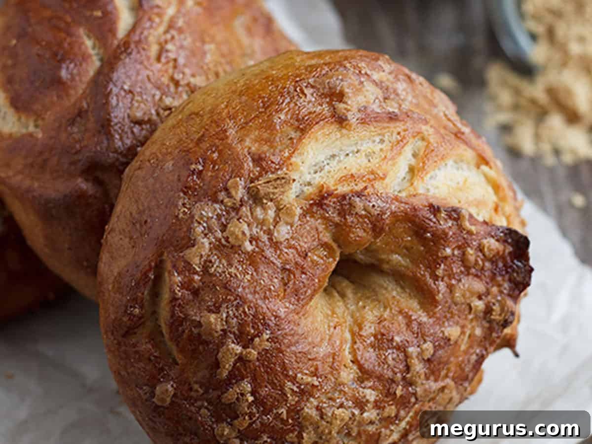 Golden French Toast Bagels on parchment paper, ready to be enjoyed for breakfast