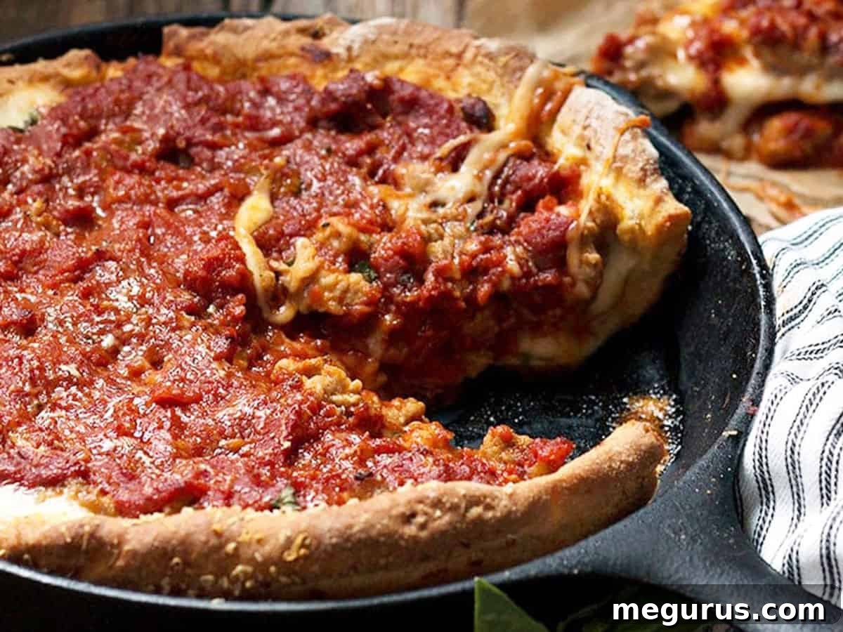 Chicago Style Deep Dish Pizza in a Cast Iron Skillet, golden-brown and bubbling
