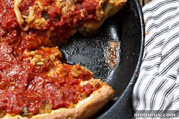 Chicago style deep dish pizza in cast iron skillet