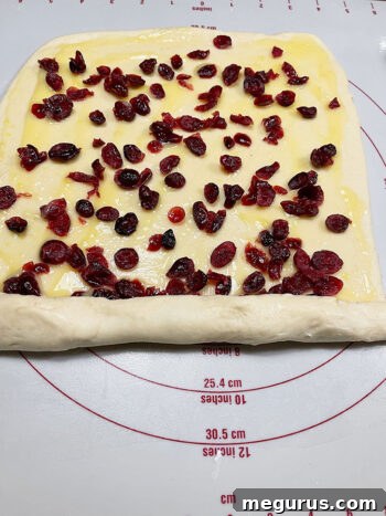 Rolling up the dough into a tight log