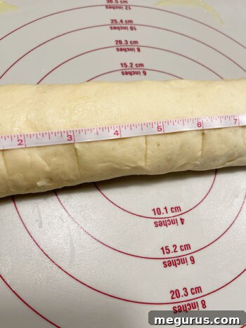 Measuring and marking the dough for consistent slices