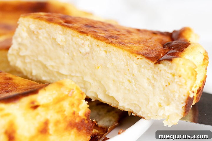 lemon basque cheesecake sliced on white plate