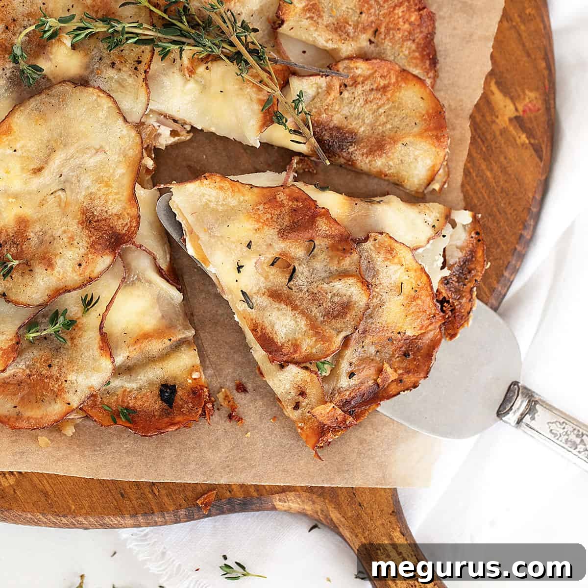 potato galette on cutting board