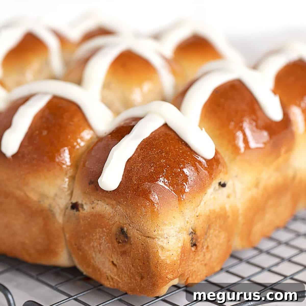 hot cross buns on cooling rack