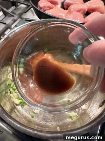 Worcestershire sauce poured into the pan