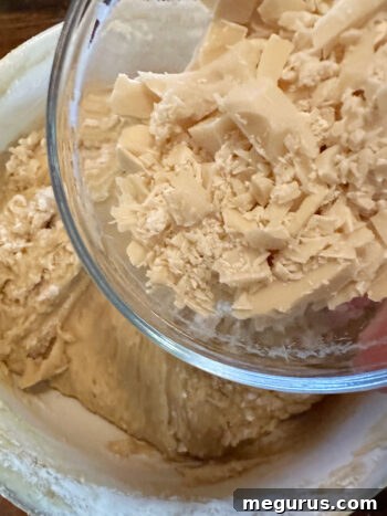 Adding chopped white chocolate to the blondie batter
