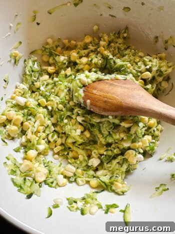The vegetable mixture and egg stirred together until fully combined.
