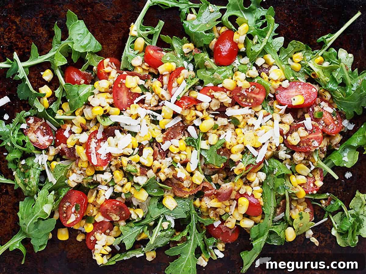 grilled corn salad with tomatoes and arugula