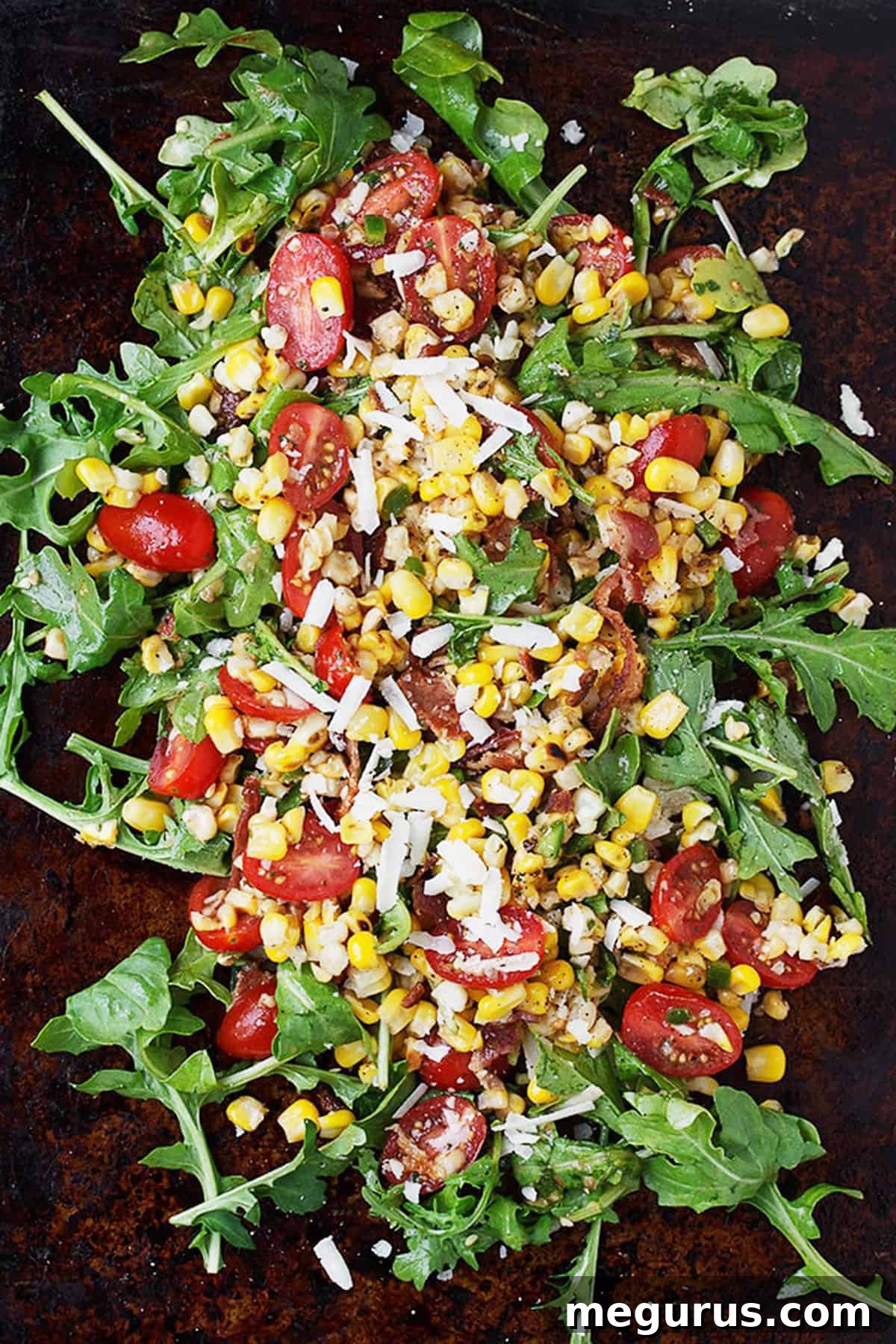 grilled corn salad with tomatoes and arugula