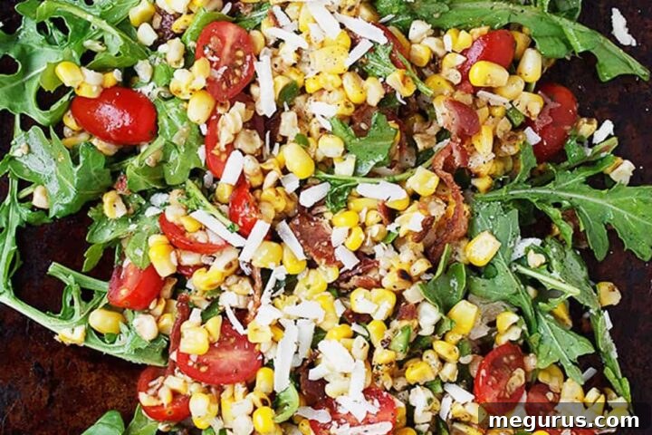 grilled corn salad with tomatoes and arugula