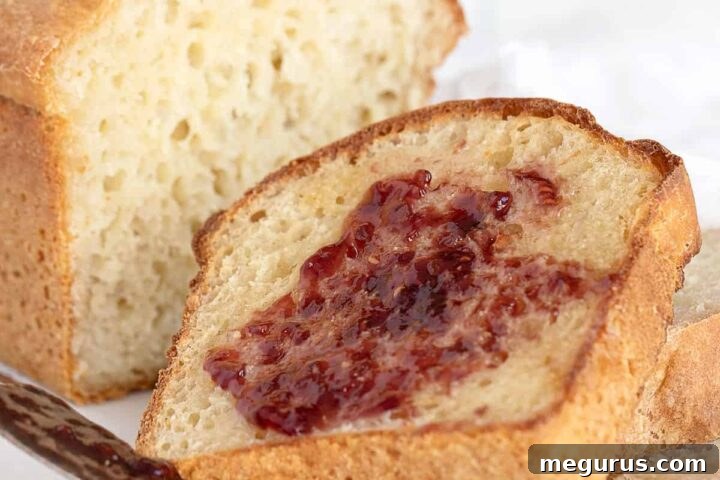 english muffin bread sliced with butter and jam