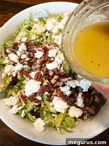 drizzling salad with vinaigrette