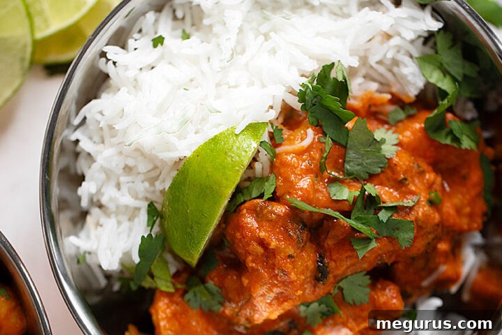Shrimp Tikka Masala in copper bowls with rice