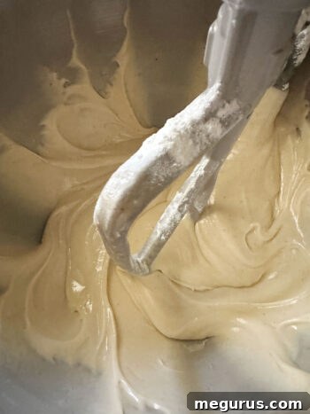 Smooth, well-combined blondie batter in a mixing bowl.