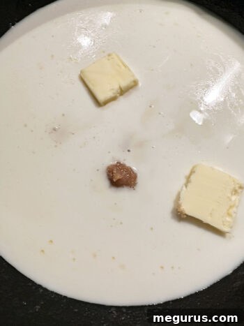 Heating milk, brown sugar, and butter in the same skillet to create the custard base