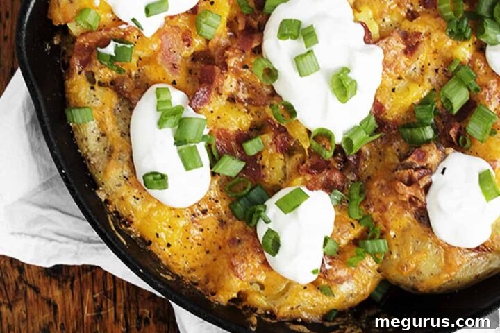 loaded smashed potato skillet in cast iron skillet