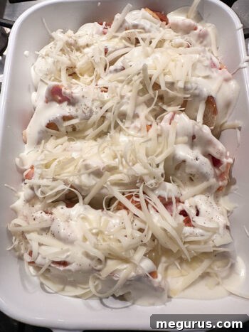 topping the casserole with extra shredded cheese before baking