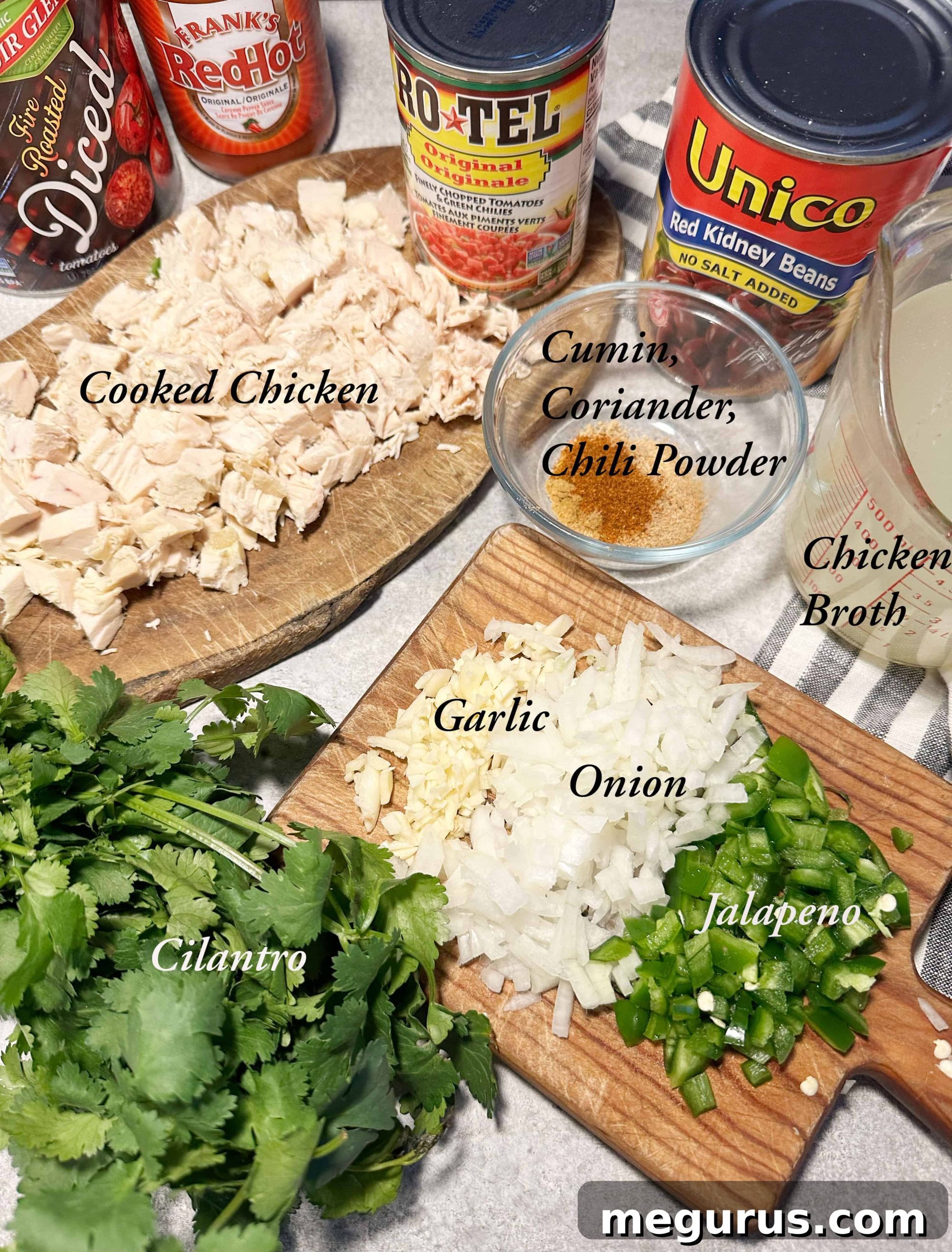 A vibrant selection of ingredients for homemade Mexican chicken soup, including fresh vegetables, canned goods, and spices.