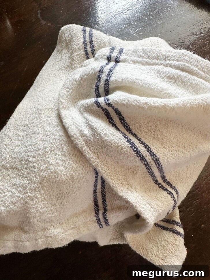 Farls wrapped in tea towel after cooking.