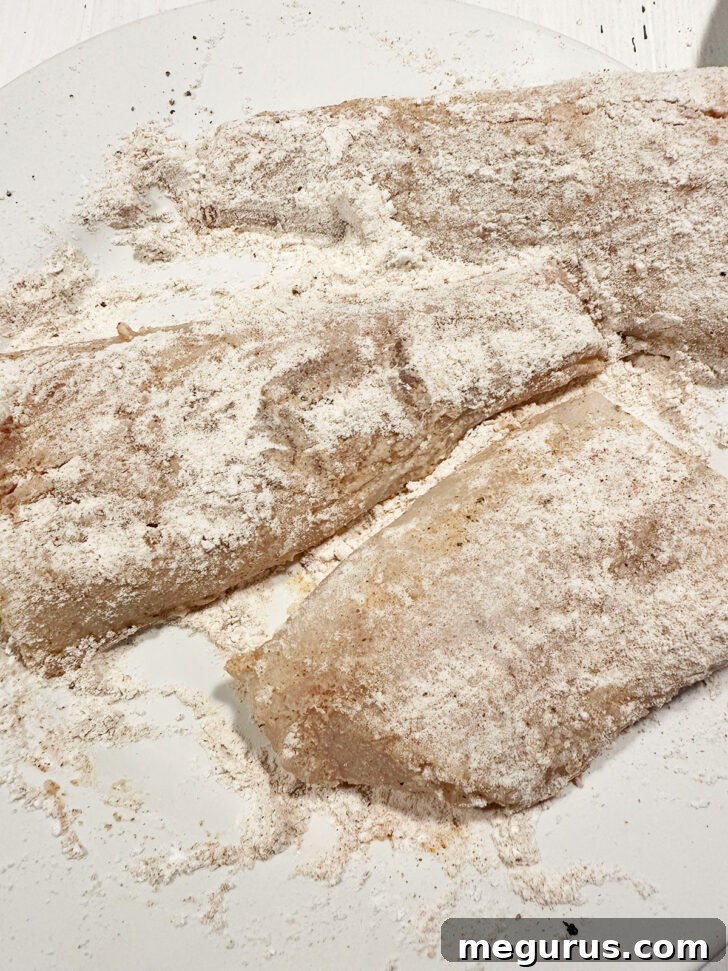 Cod after coating in the flour mixture