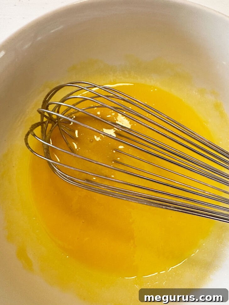 Eggs and sugar whisked together until light and creamy.