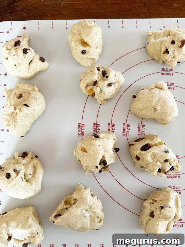 12 dough pieces on the work surface.