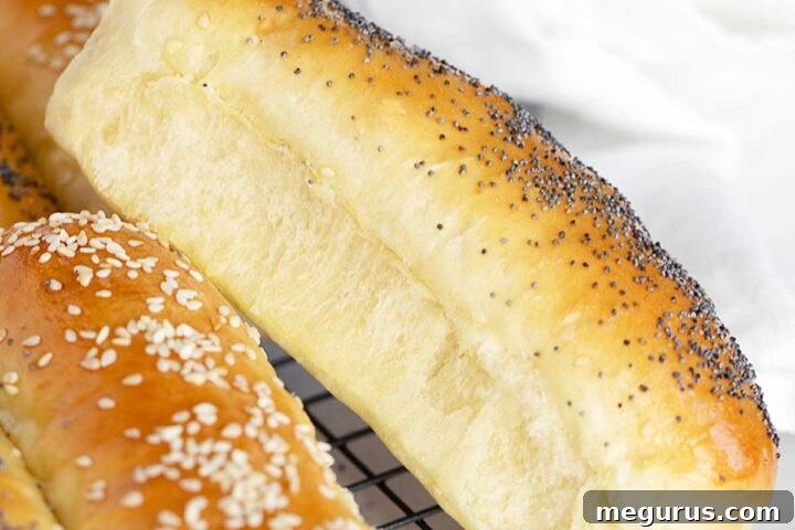 Fluffy Brioche Hot Dog Buns on a cooling rack, ready to be enjoyed.