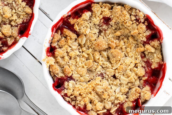 Strawberry crisp in ramekins, a close-up shot.
