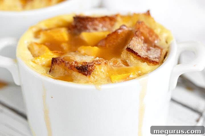 peach bread pudding with brown sugar sauce in ramekins