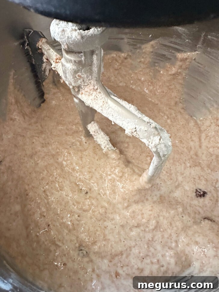 The liquid-y finished muffin batter in a mixing bowl, ready for chilling.