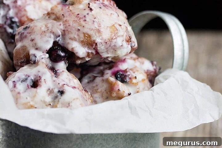 Delicious glazed blueberry fritters, a perfect sweet treat
