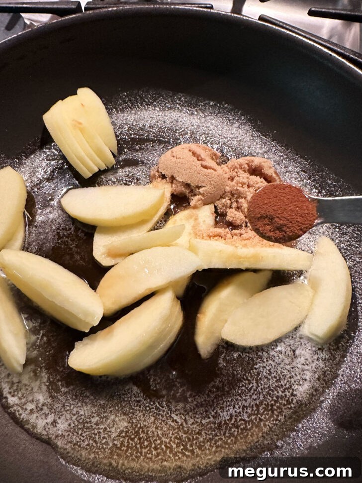 Brown sugar and cinnamon, added to skillet.