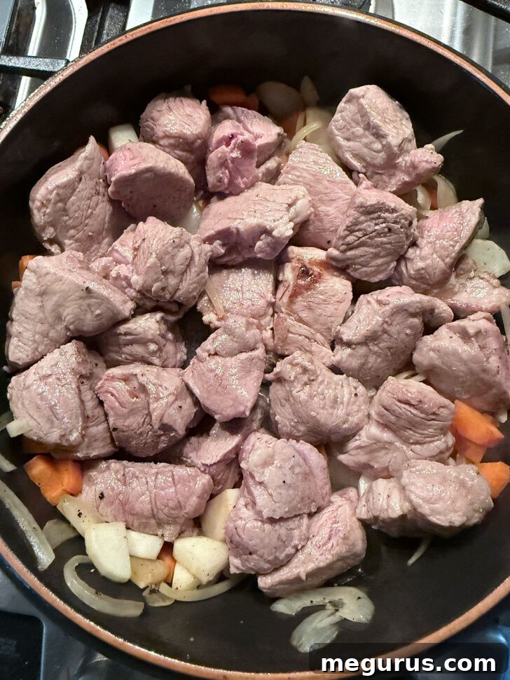 Pork returned to the skillet.