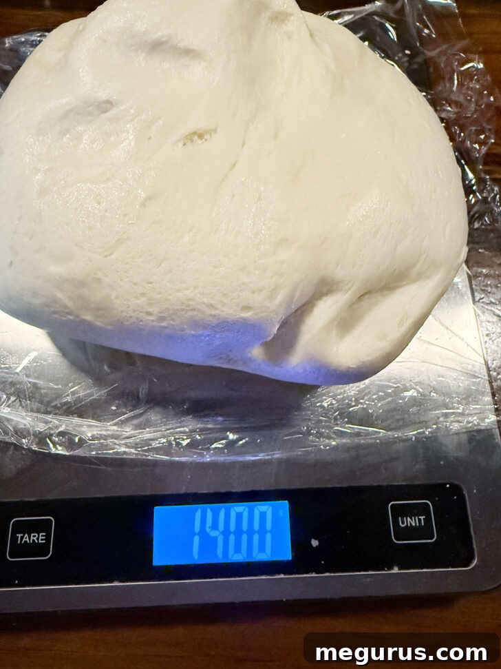 Weighing the dough ball.
