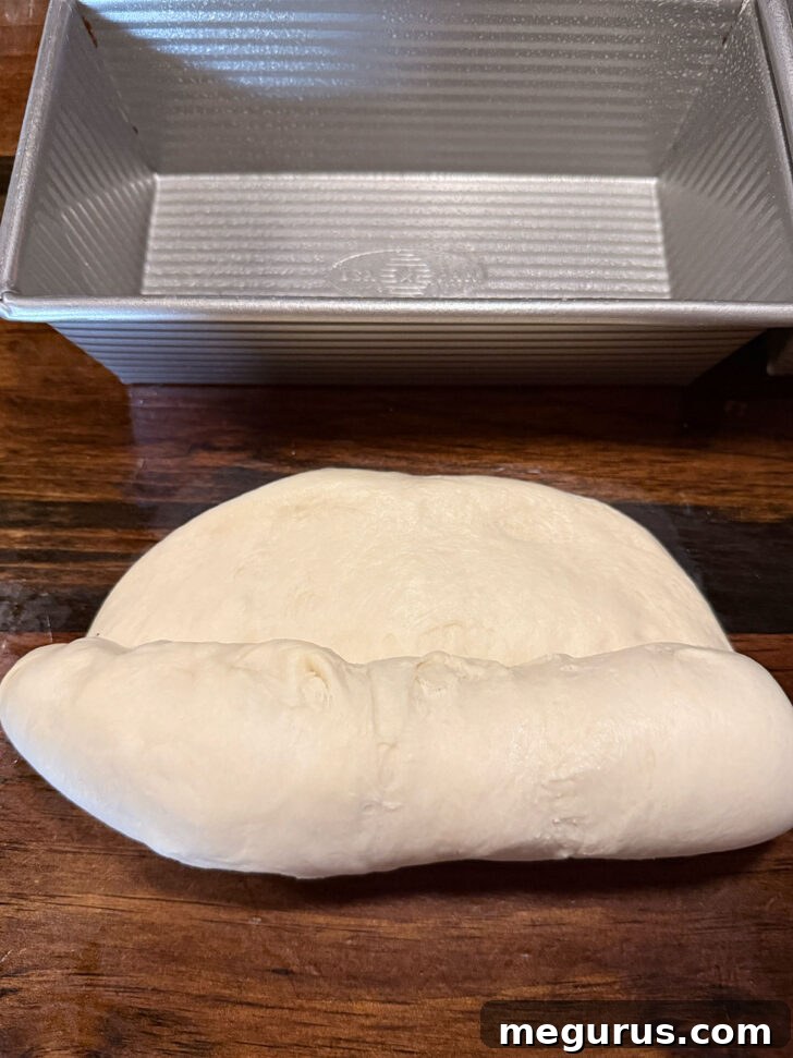 Rolling up dough.