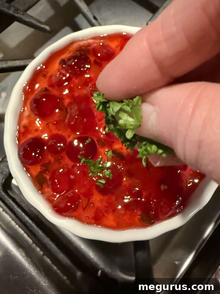 Sprinkle dip with fresh parsley.