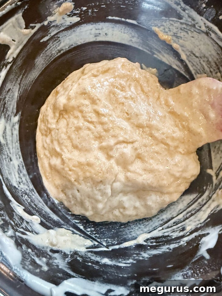 Batter after stirring in some of the egg whites to loosen it.