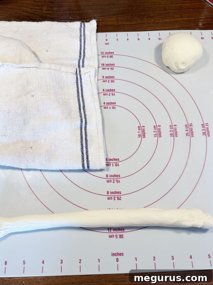 A perfectly rolled 24-inch dough rope ready for shaping.