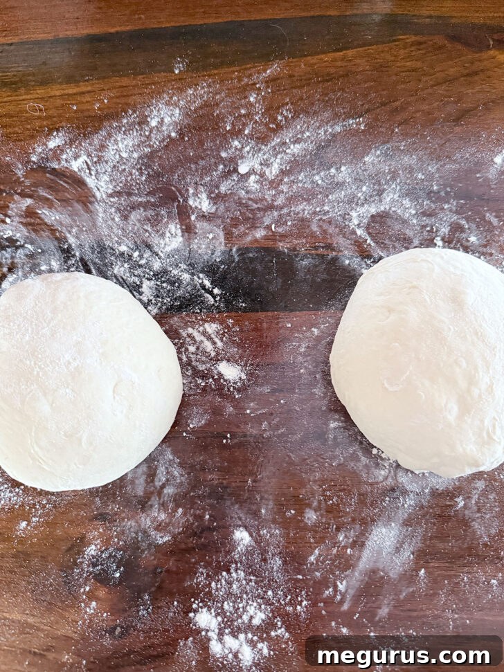 Forming the dough into two balls.