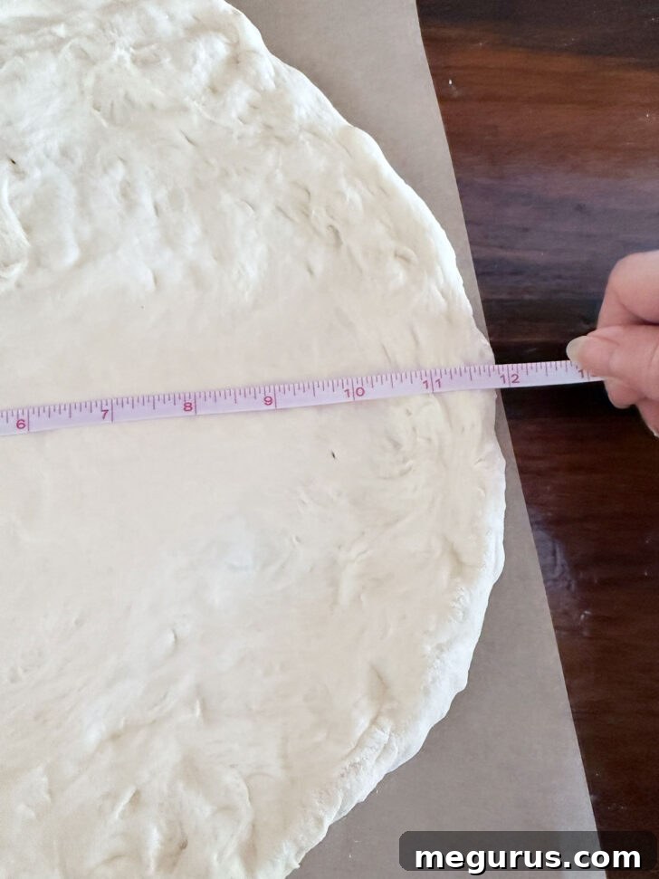 Pizza dough after stretching to 12" diameter.