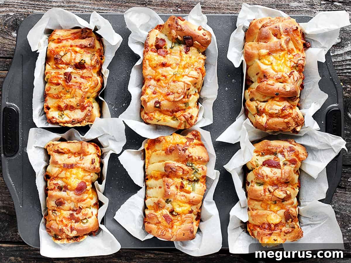 Irresistible Loaded Baked Potato Pull Apart Loaves, perfect for soup dipping.