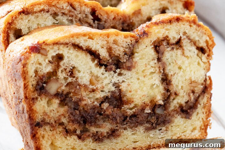 Hungarian coffee cake loaf on cutting board.