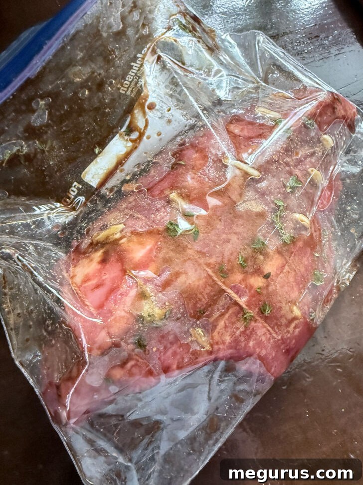 Roast with marinade sealed in a zipper bag.