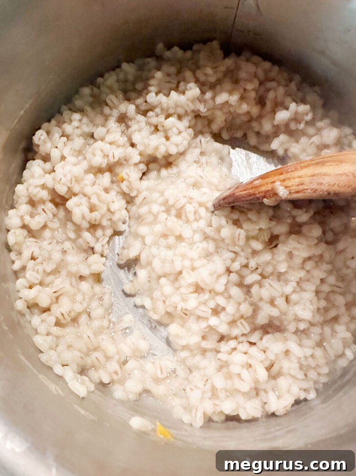 Perfectly cooked pearl barley in a saucepan.