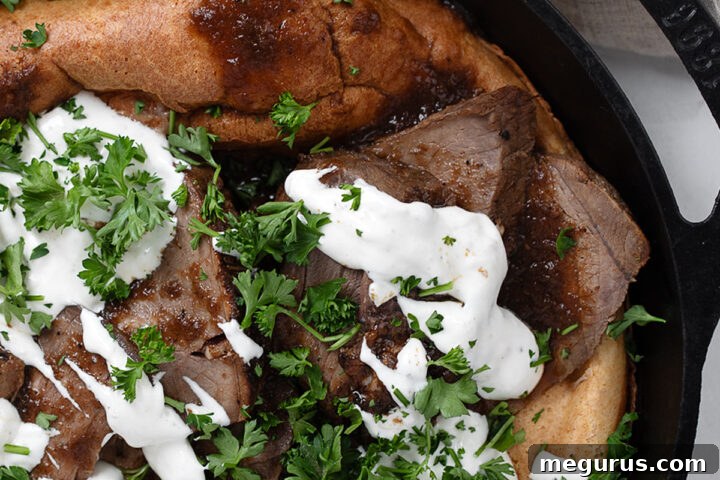 Leftover roast beef and Yorkshire pudding in cast iron skillet.