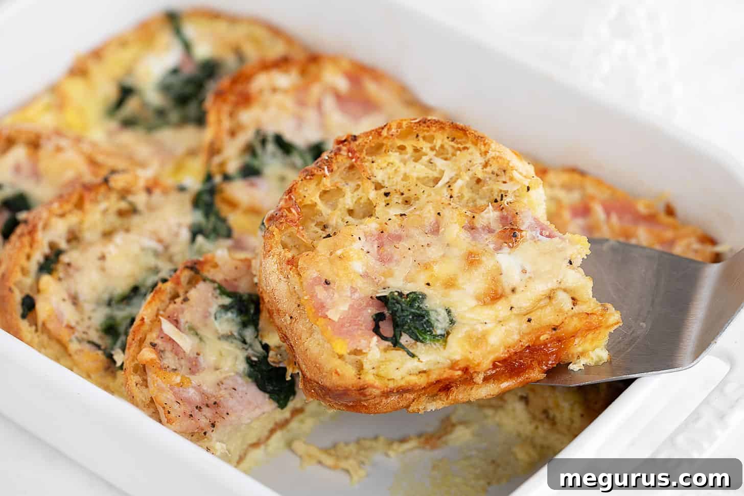 English muffin breakfast casserole in baking dish.
