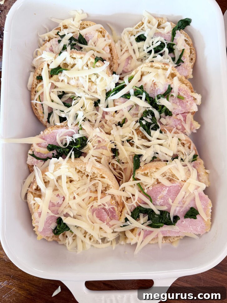 Breakfast casserole topped with Gruyere cheese.